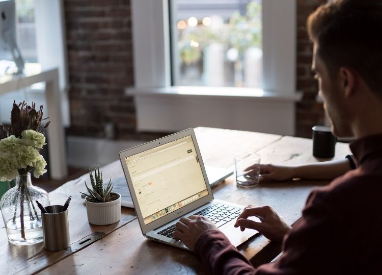 man working at office desk