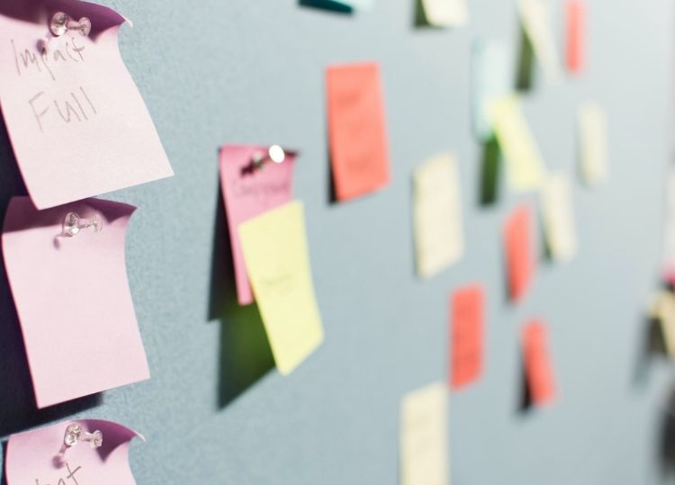 post-it notes on a wall 